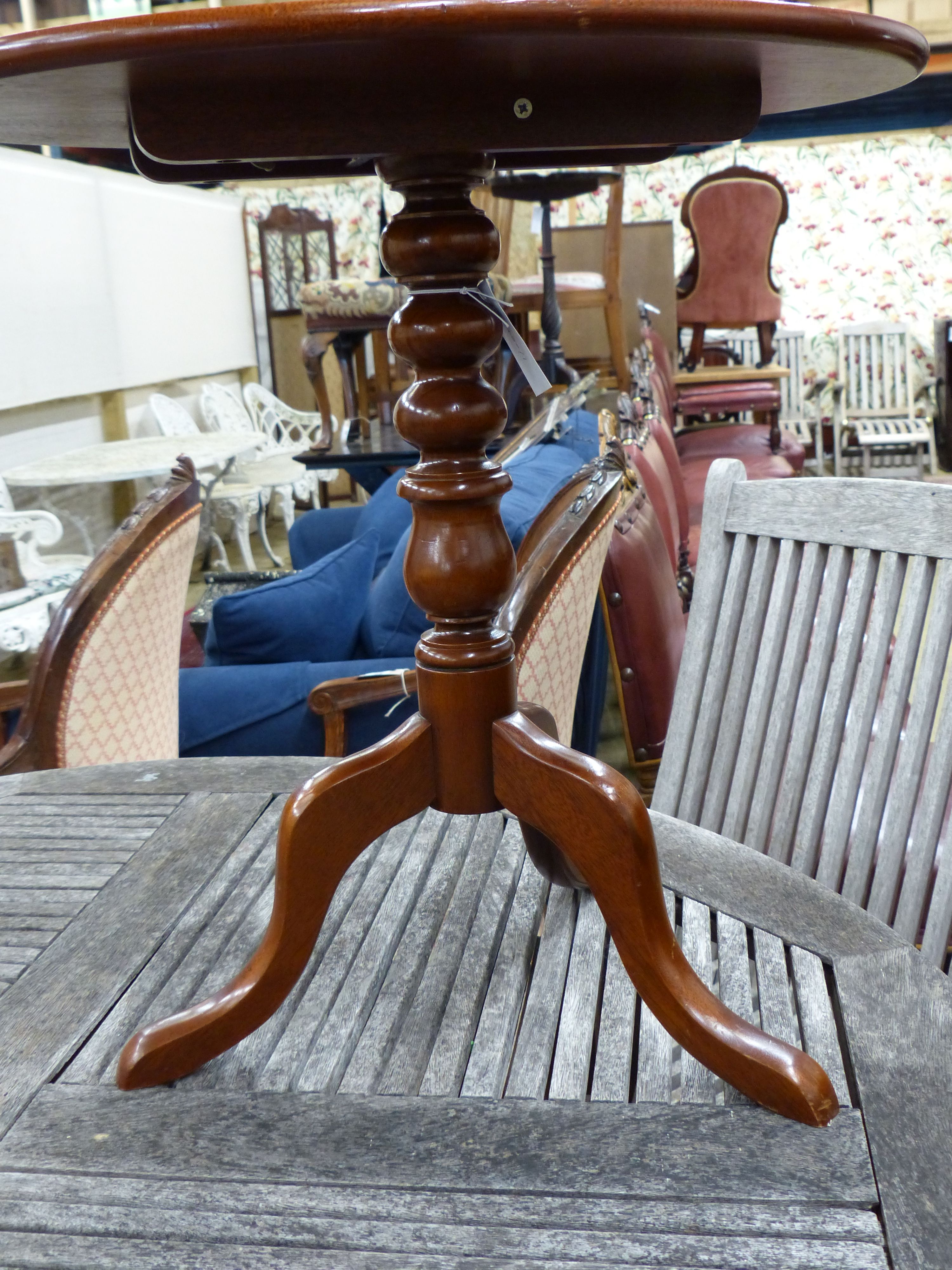 A 19th century style mahogany tilt top occasional table, 55cm